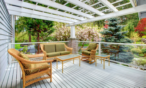 A composite deck with white railings.